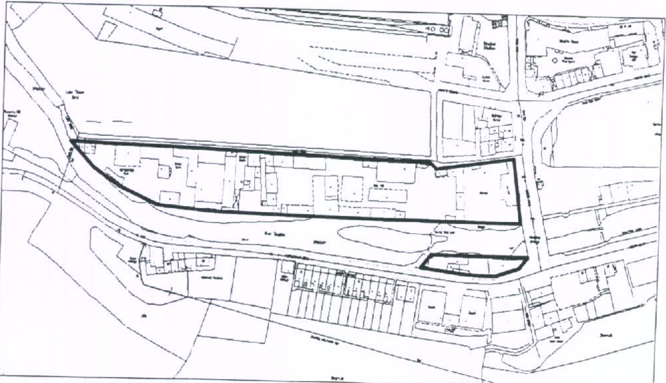 A black and white site plan showing the proposed development area outlined in thick black lines, situated near the River Douglas and surrounded by existing buildings and roads.