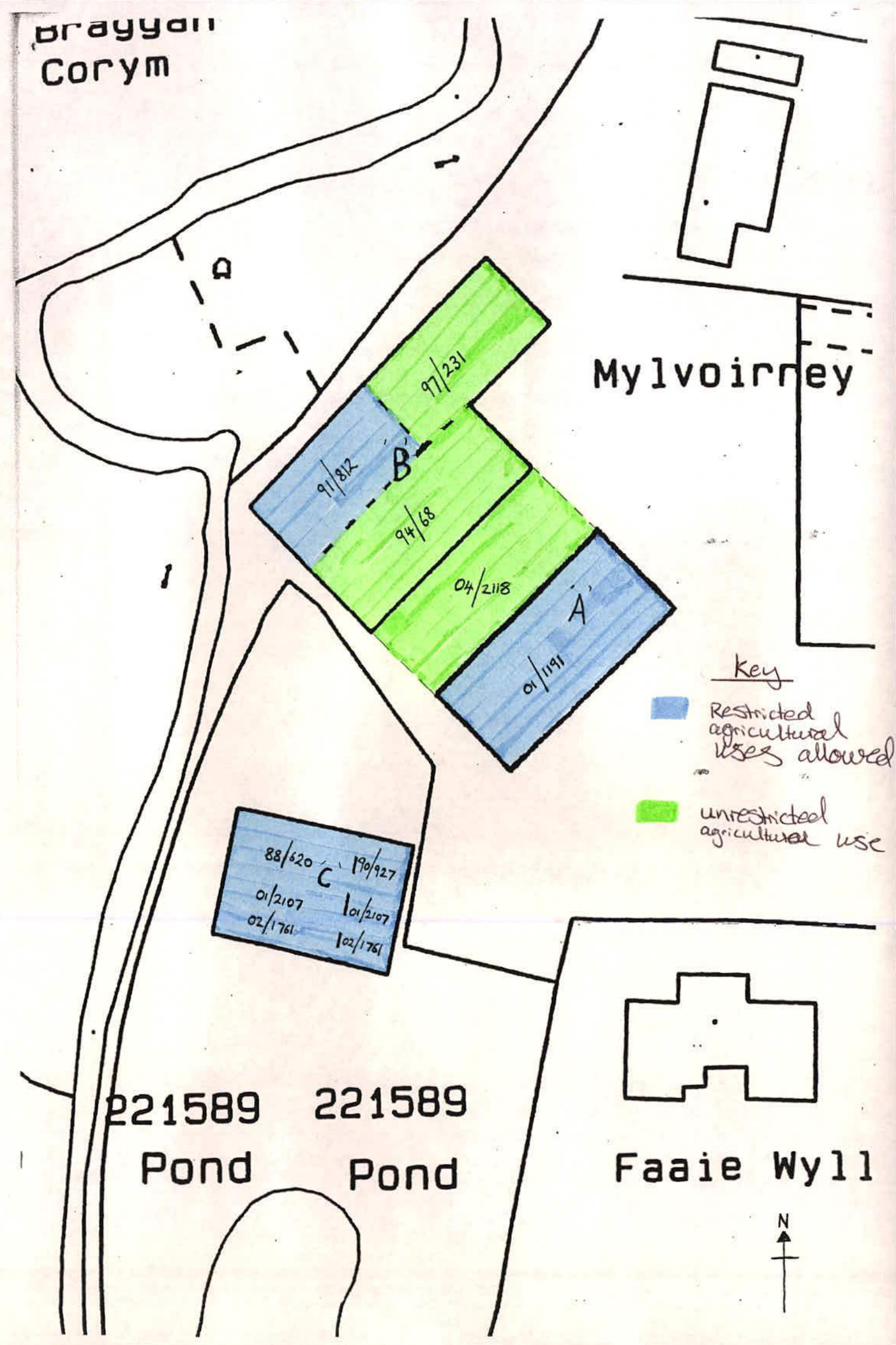 A hand-drawn sketch map displaying land parcels with a key indicating restricted and unrestricted agricultural use zones.