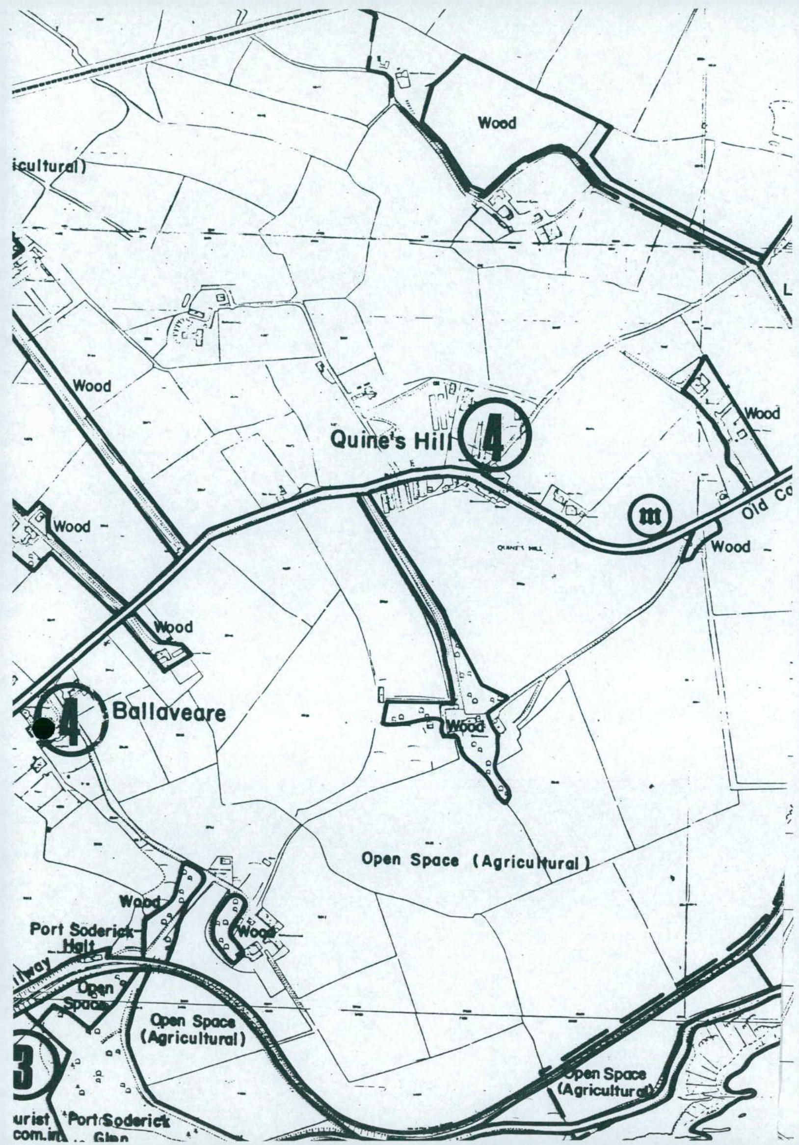 A black and white location map showing the rural area around Quine's Hill and Ballaveare, highlighting agricultural open space and woodlands with boundary lines.