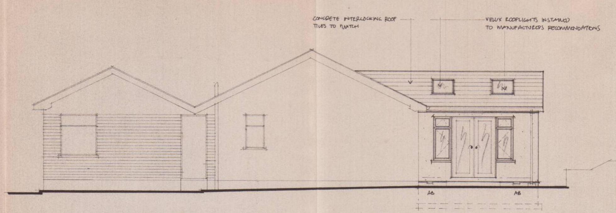 An architectural elevation drawing showing the side view of a residential property with a single-storey extension featuring rooflights and patio doors.