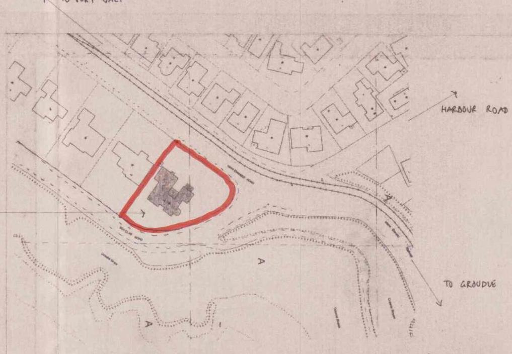 A hand-drawn site plan highlighting a specific property plot with a red outline, showing its position on Harbour Road relative to neighboring buildings.