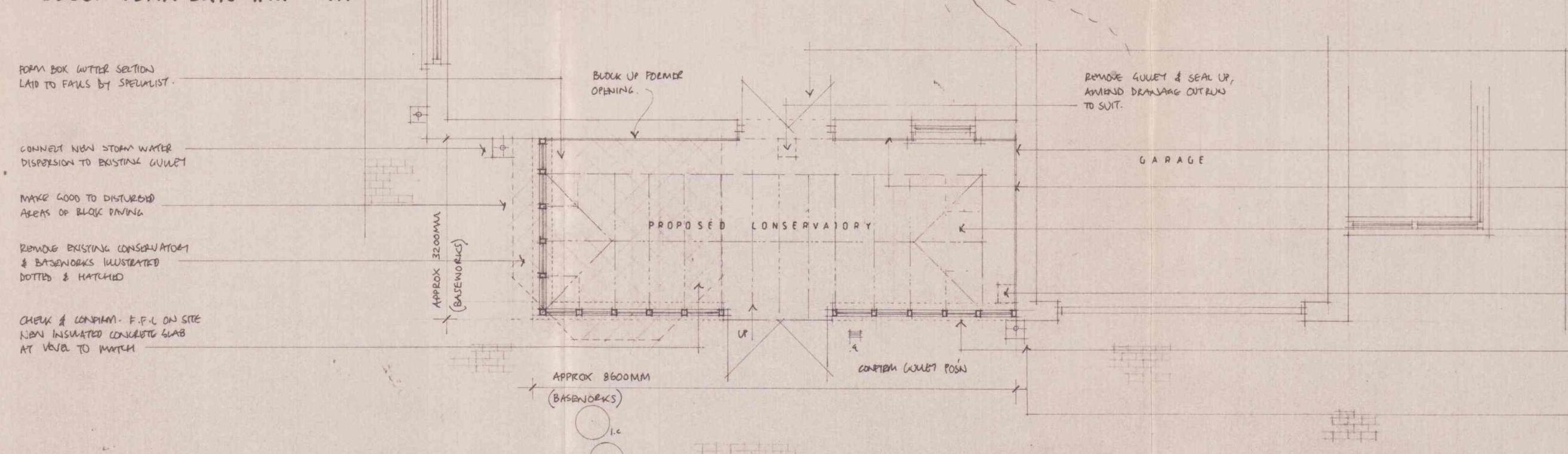 Architectural floor plan drawing showing the layout and dimensions of a proposed conservatory and adjacent garage.