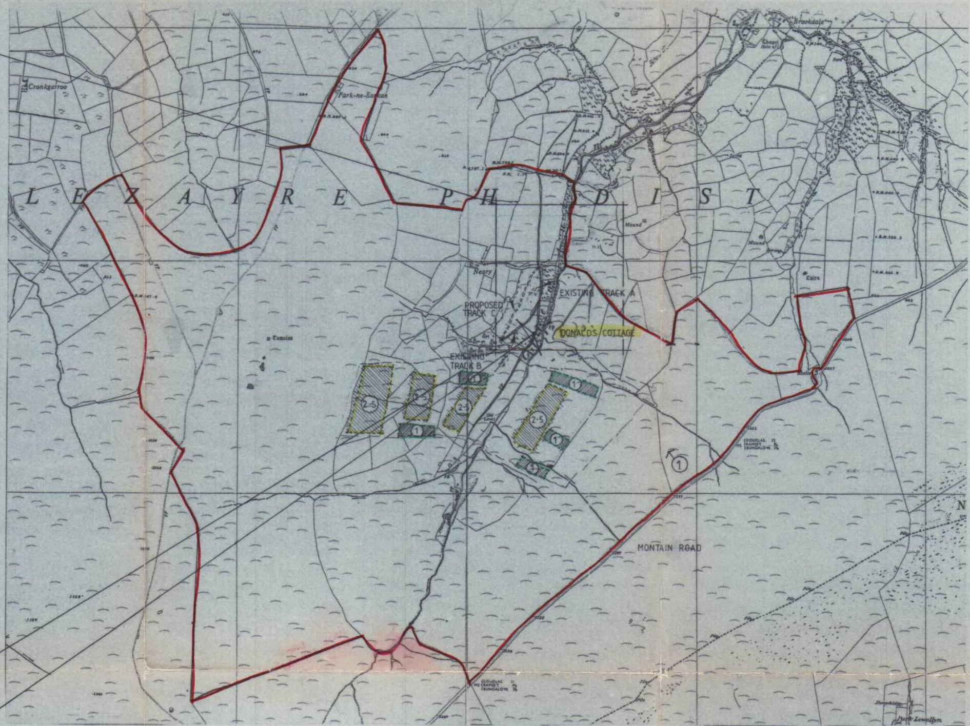 This image displays a site plan map for the Lezayre parish, highlighting the location of Donald's Cottage and proposed track access routes.