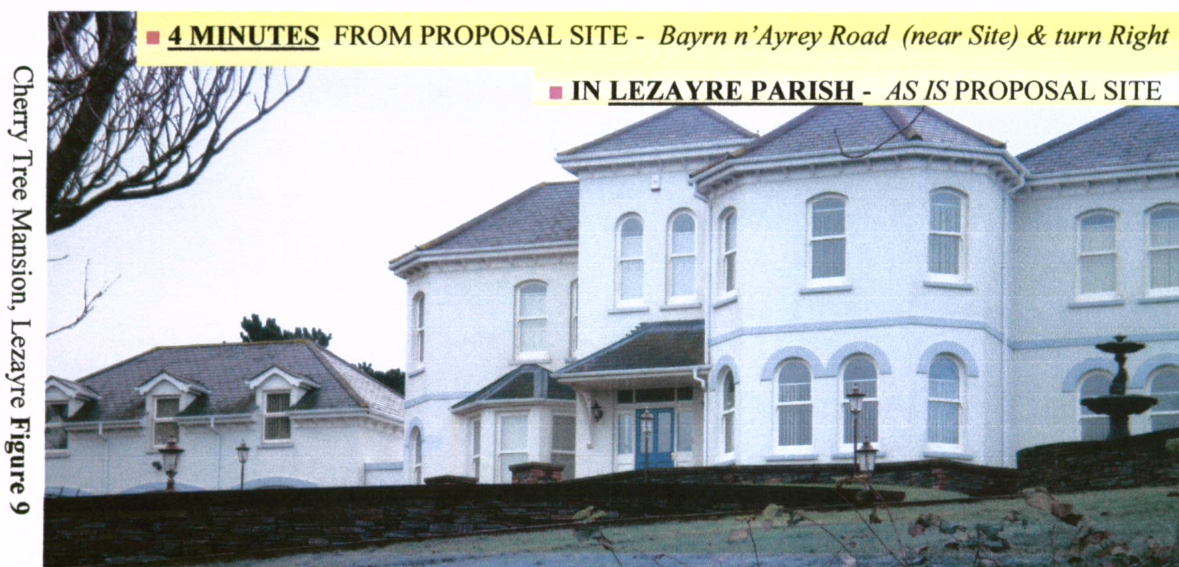 A photograph showing a large white detached mansion and an adjacent building, identified by text as the existing proposal site in Lezayre parish.