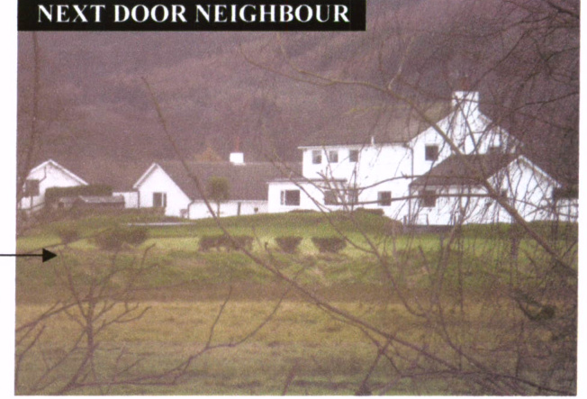 A photograph labeled 'NEXT DOOR NEIGHBOUR' showing a row of white detached cottages on a grassy slope, viewed through foreground branches.