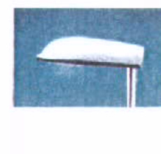 A low-resolution close-up image showing a white, curved outdoor light fixture or lamp post against a blue background.