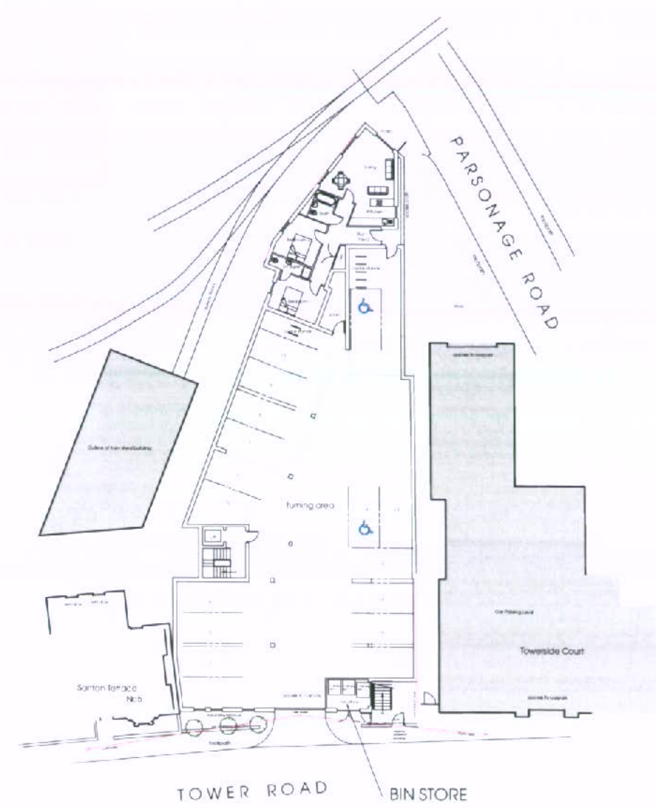 A site plan showing the layout of a new residential development with 17 apartments, including parking spaces, a turning area, and the building footprint adjacent to Parsonage Road and Tower Road.