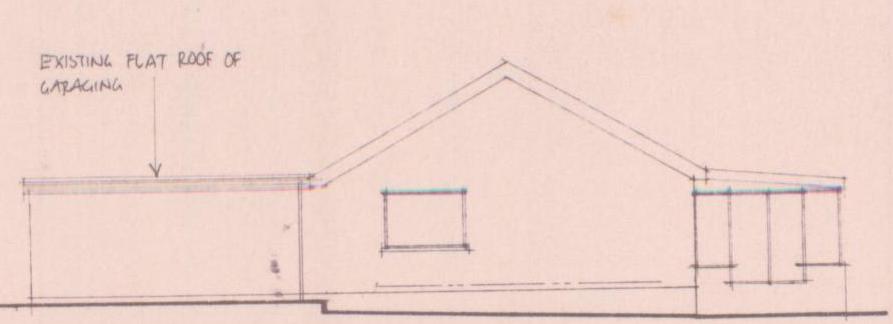 Architectural elevation drawing showing a house with a gable roof and flat roof sections labeled as existing garaging.