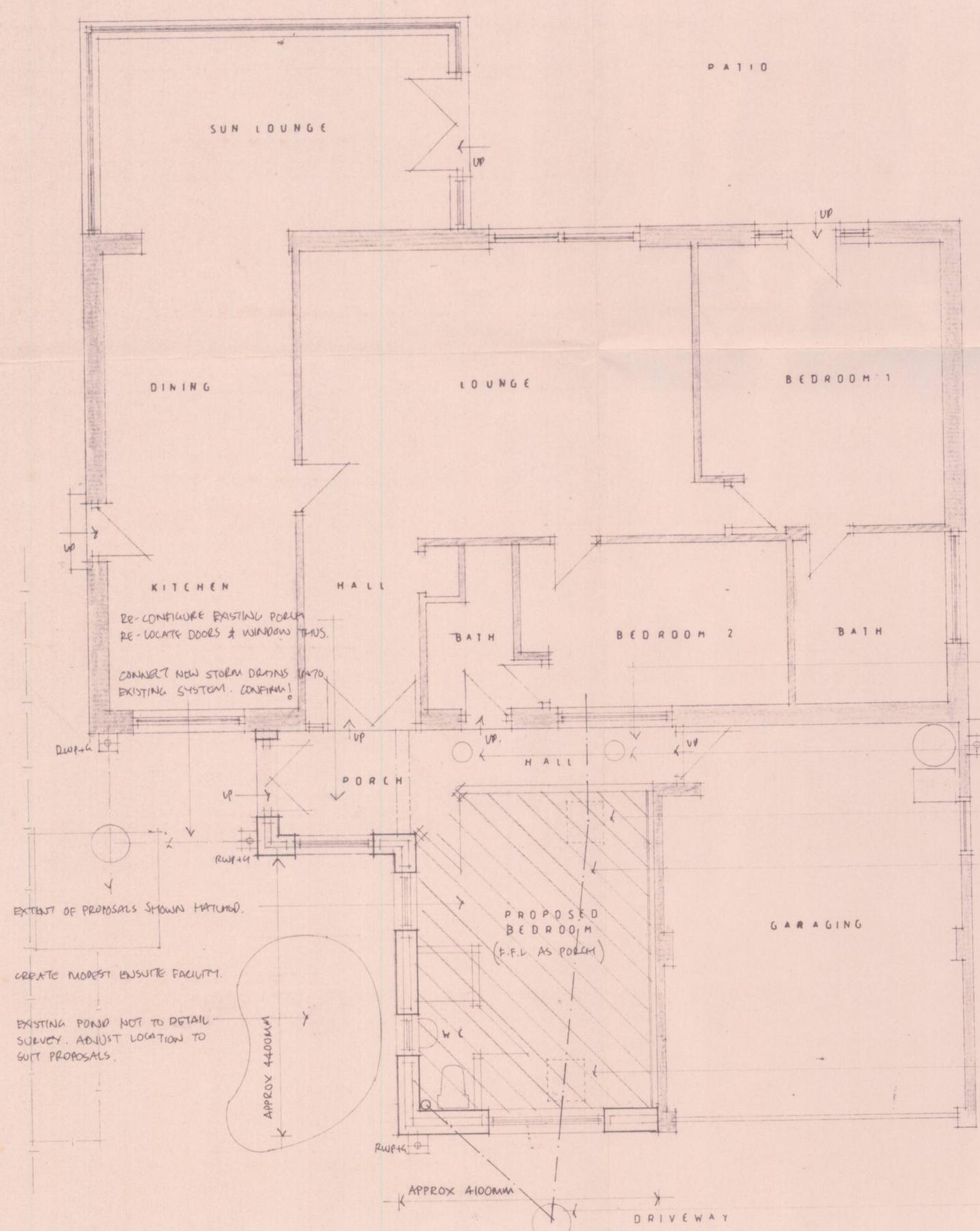 Architectural floor plan showing the internal layout of a house with a proposed bedroom extension and garage area.