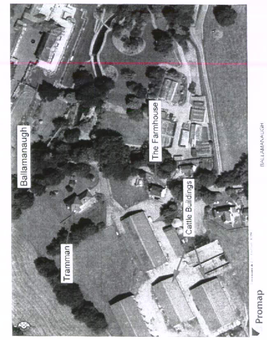 Aerial view map of a rural farmstead showing 'The Farmhouse' and 'Cattle Buildings' with a red boundary line.