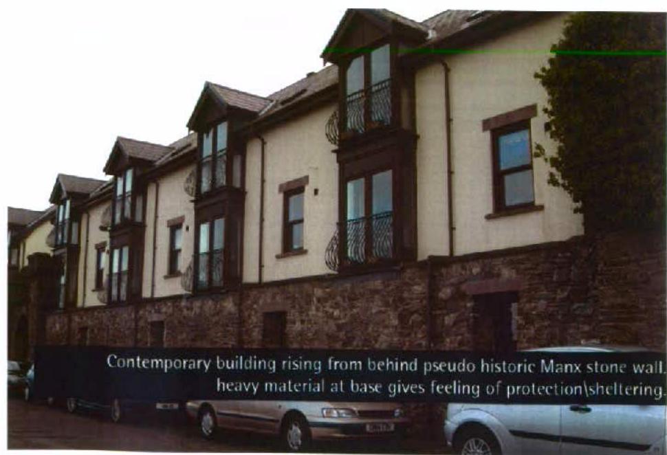 A photograph showing a row of terraced residential buildings with a stone retaining wall base and cream upper facades, featuring overlaid descriptive text.