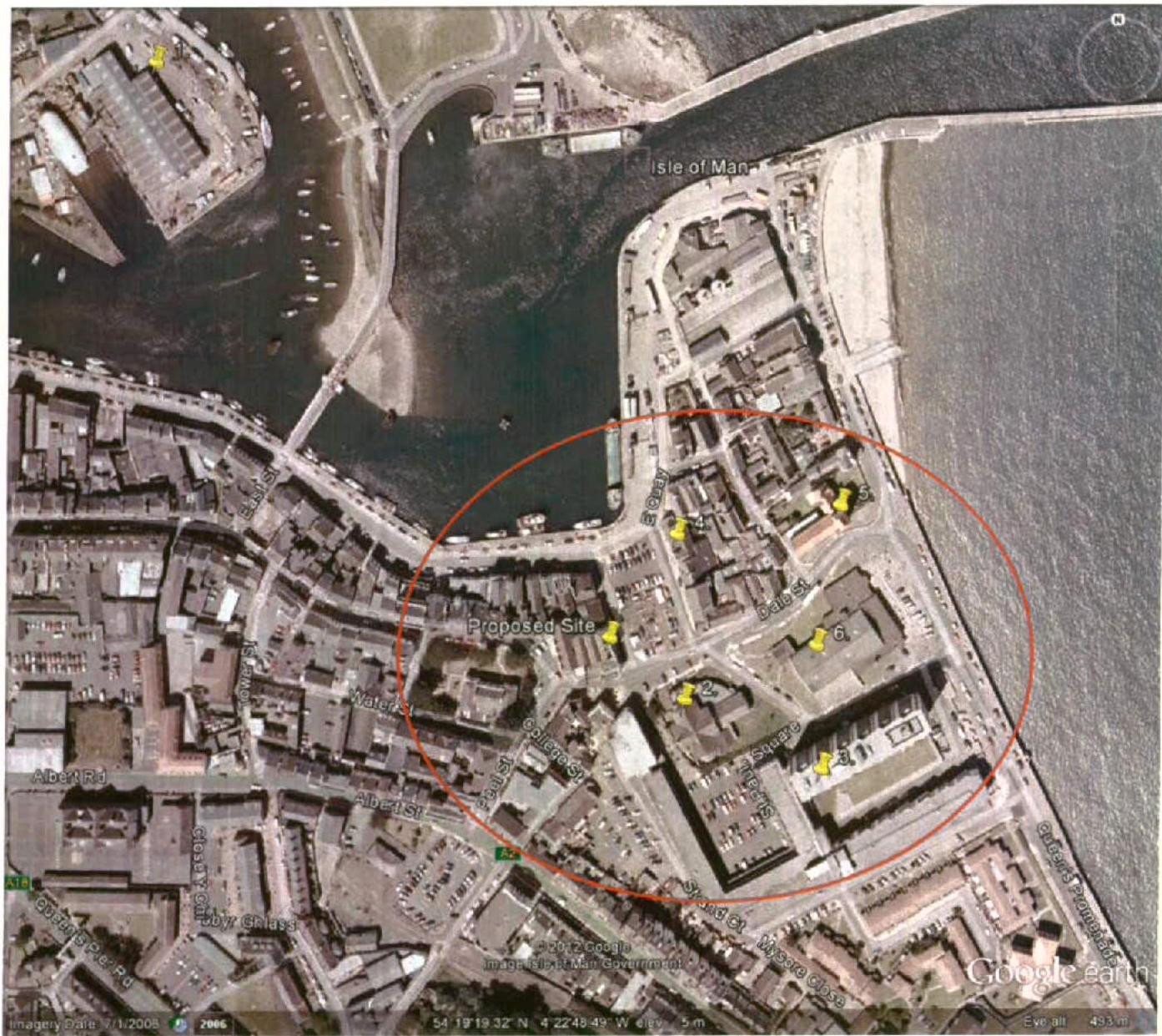 An aerial site location map displaying a coastal town area with a red circle highlighting the proposed site and yellow markers indicating specific building locations.