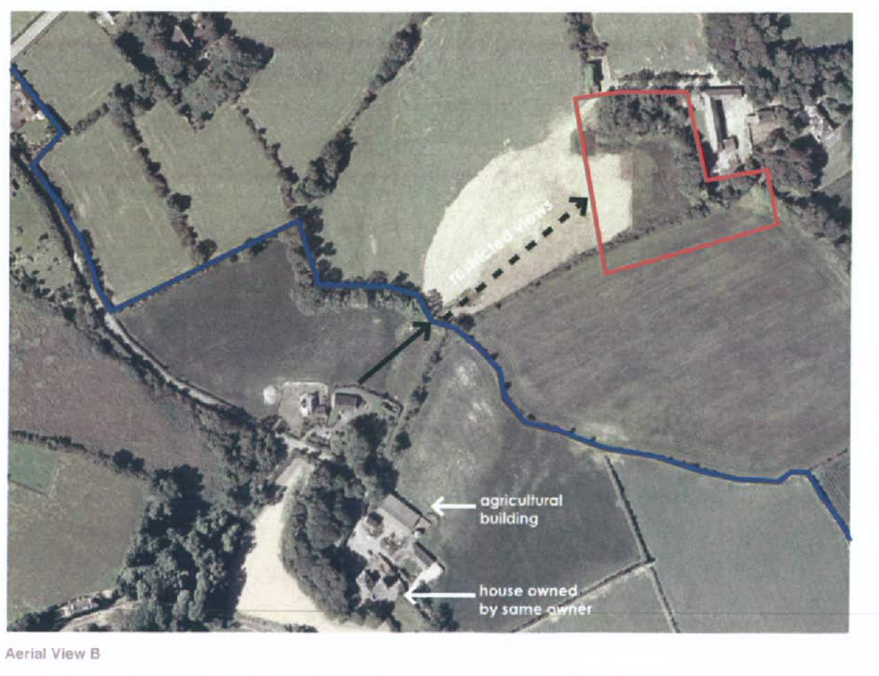 Annotated aerial photograph showing a rural site with red boundary lines, nearby agricultural buildings, and text indicating restricted views.