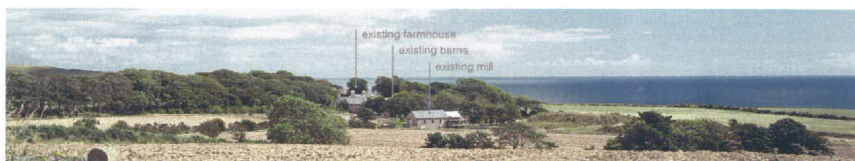 A panoramic photograph of a rural coastal site showing existing farm buildings including a farmhouse, barns, and mill surrounded by trees and fields.