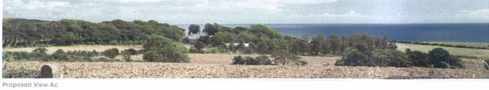 A panoramic photograph showing a rural coastal landscape with fields, trees, and distant buildings overlooking the sea, labeled 'Proposed View Ac'.