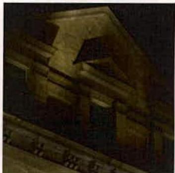 A grainy night photograph showing the illuminated upper facade and roofline of a stone building.