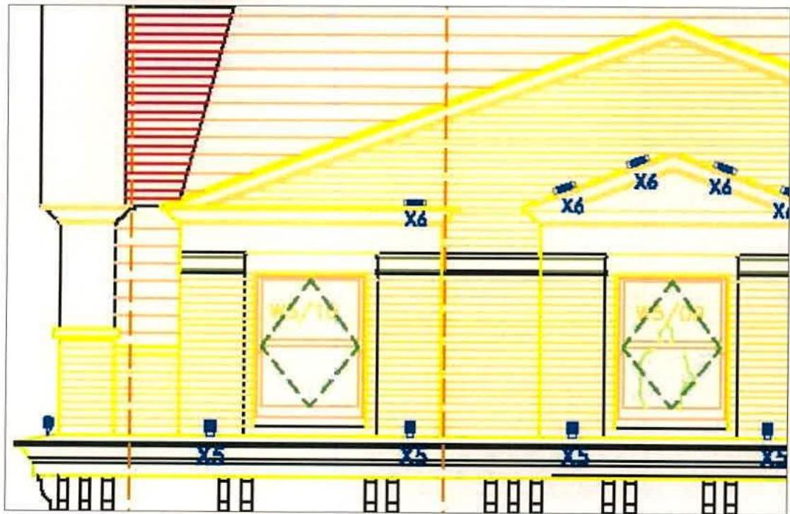 Technical architectural elevation drawing showing the proposed installation of external lighting fixtures on a building facade, with yellow highlights indicating light positions. A boundary fence or railing is visible...