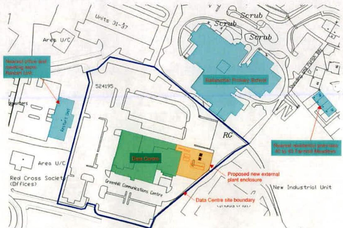 A site plan illustrating the proposed data centre extension and plant enclosure at the Greenhill Communications Centre, showing the site boundary and surrounding properties like a primary school.
