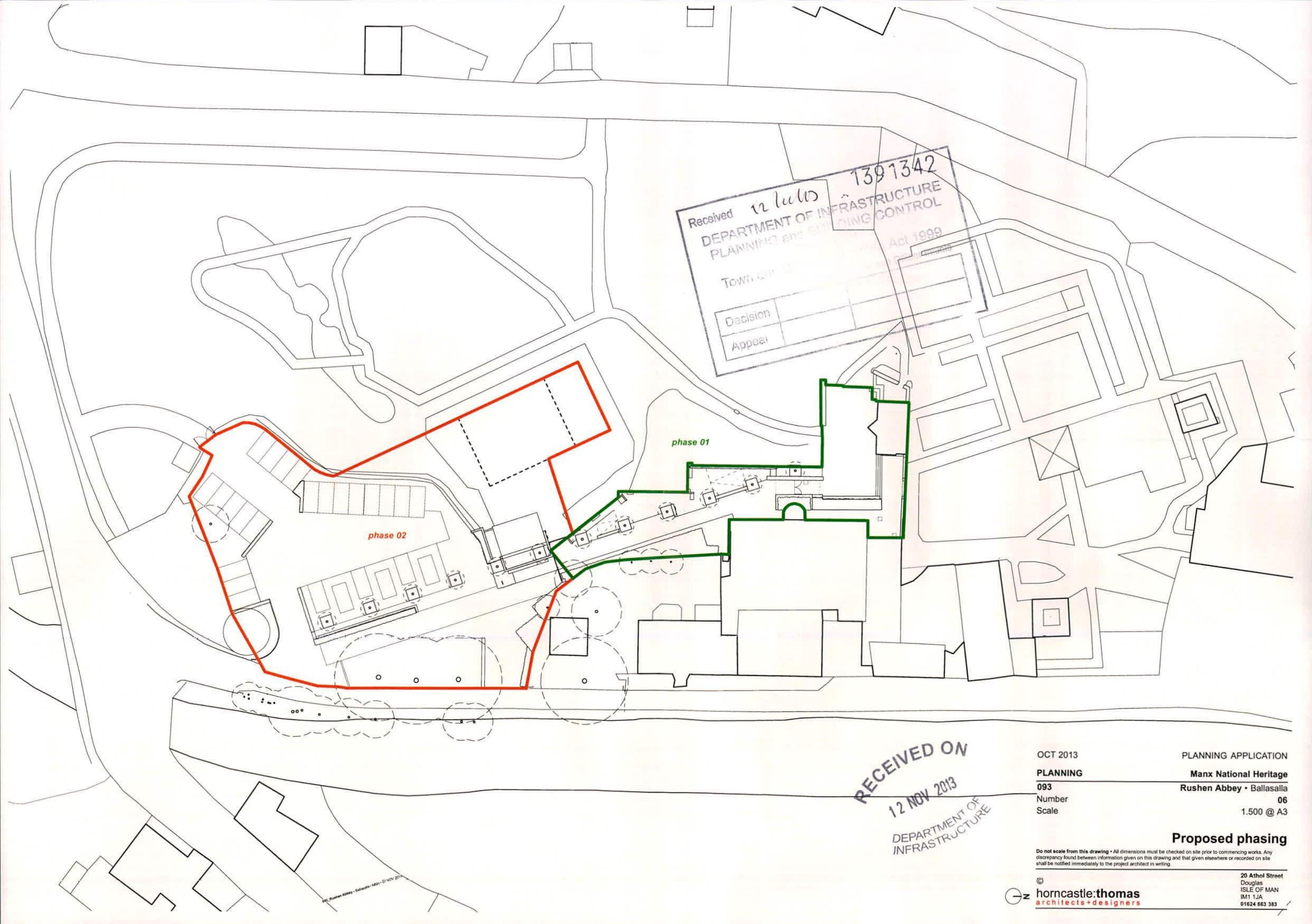 A site plan drawing showing the layout of a development with parking spaces, building footprints, and proposed phasing outlined in red and green.