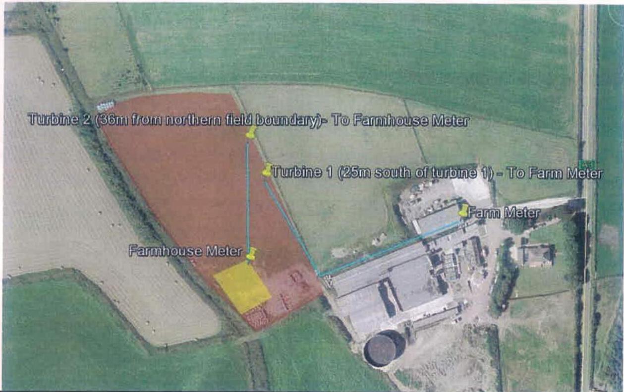An aerial site plan showing the proposed locations for two wind turbines in a field adjacent to farm buildings. The map includes annotations for cable routes to meters and distances from field boundaries.