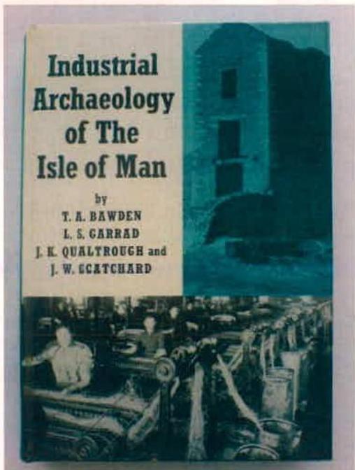A photograph of the cover of the book 'Industrial Archaeology of The Isle of Man' by T.A. Bawden, featuring images of a stone mill and industrial workers.