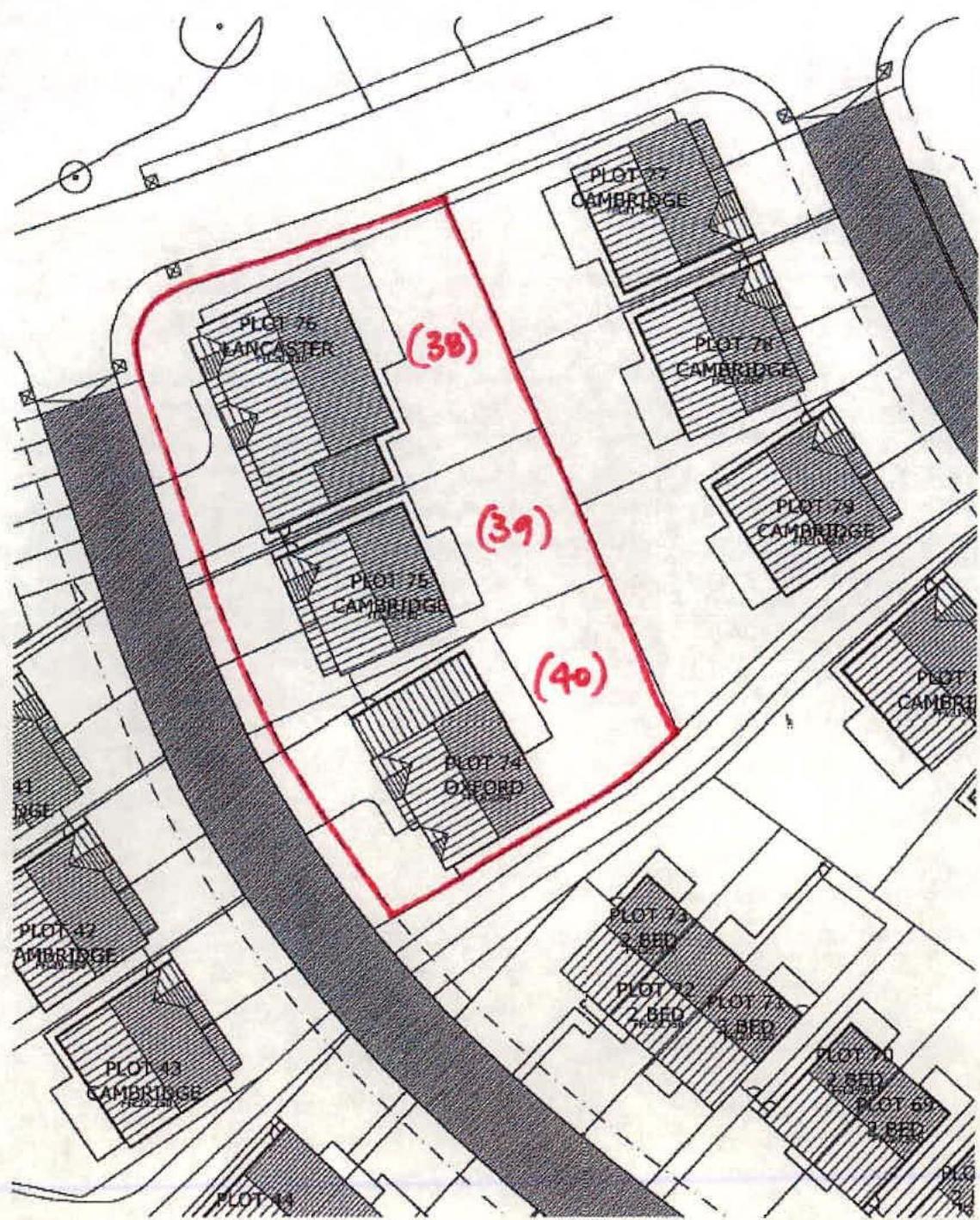 A site plan illustrating the layout of a housing development, highlighting specific plots with red outlines and labels.