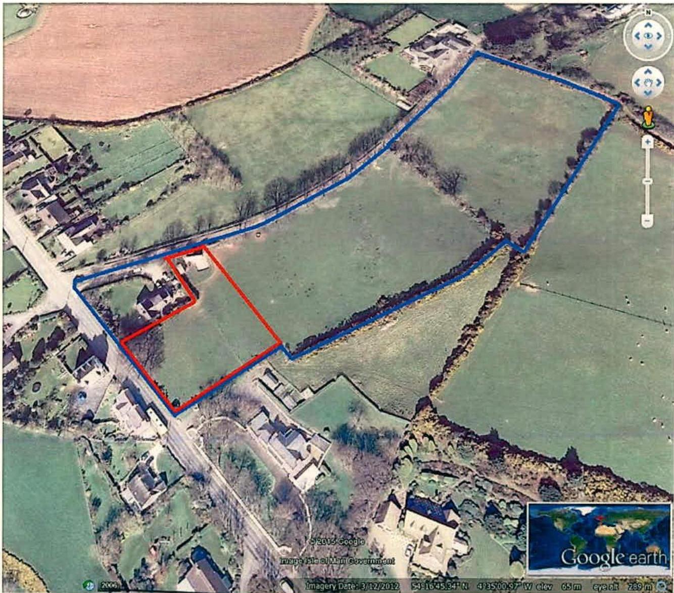 An aerial Google Earth view of a rural site with red and blue boundary lines overlaid to indicate the proposed development plot and surrounding land.