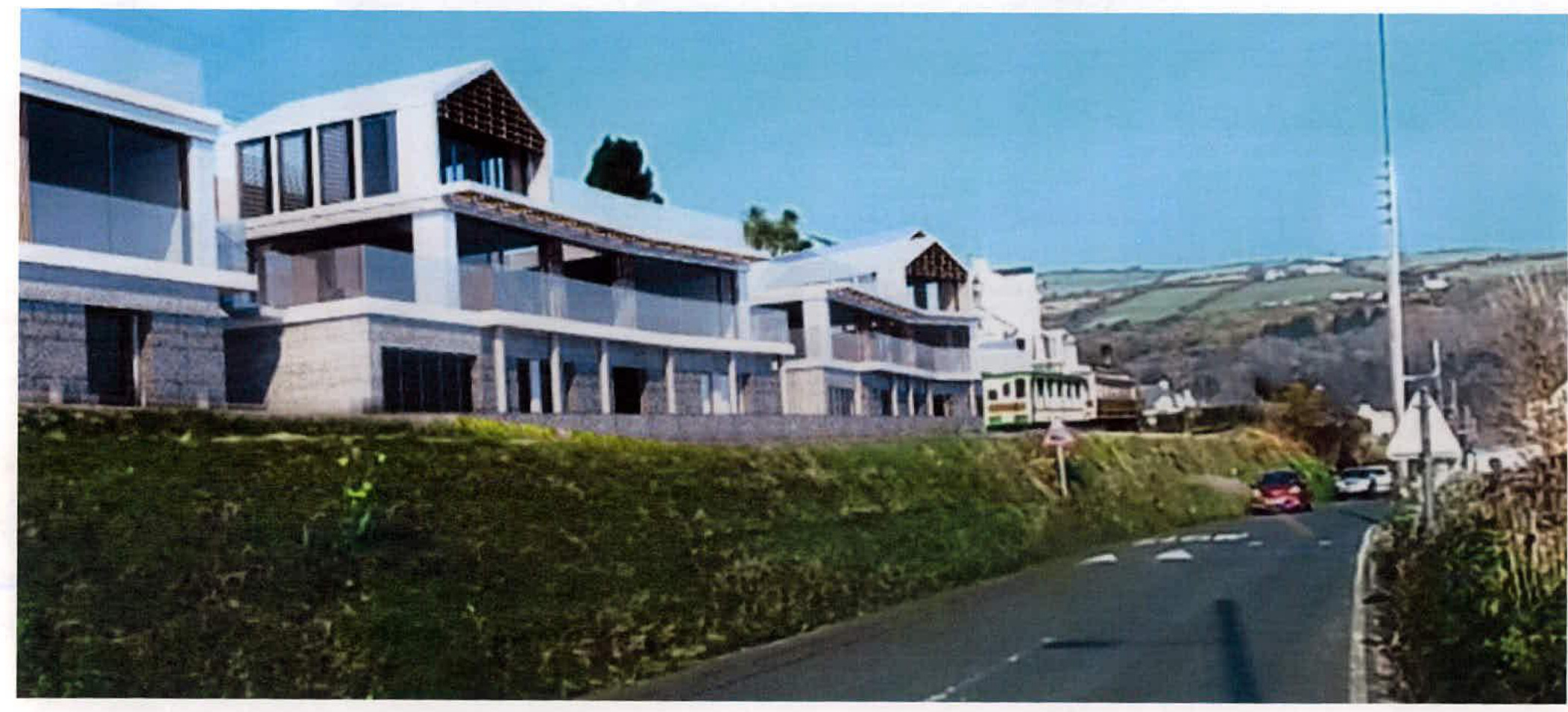 A photograph or rendering showing a modern residential development with white facades and balconies situated on a grassy hillside next to a road.