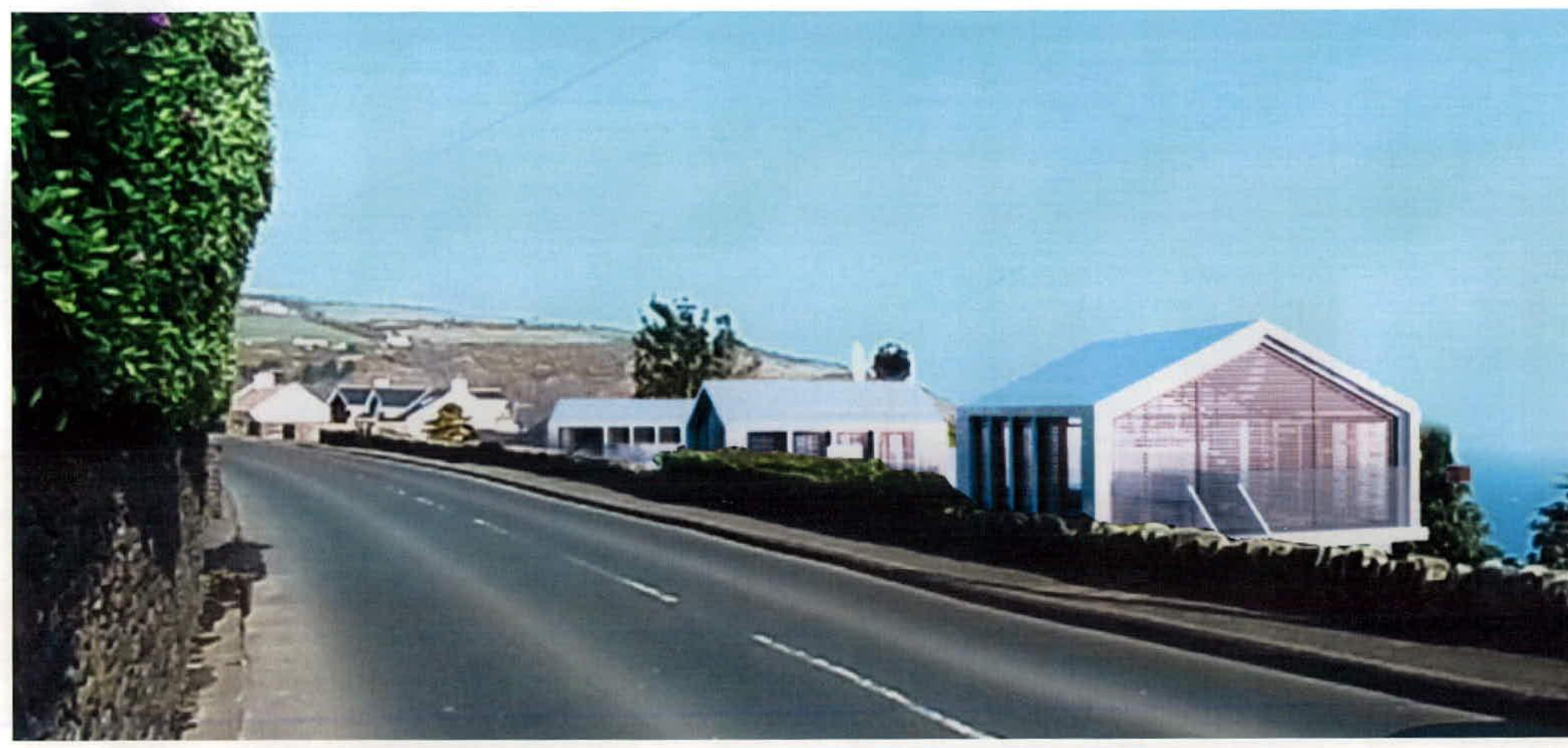 A street-level view showing a road lined with stone walls and white buildings, including a modern structure on the right, set against a rural backdrop.