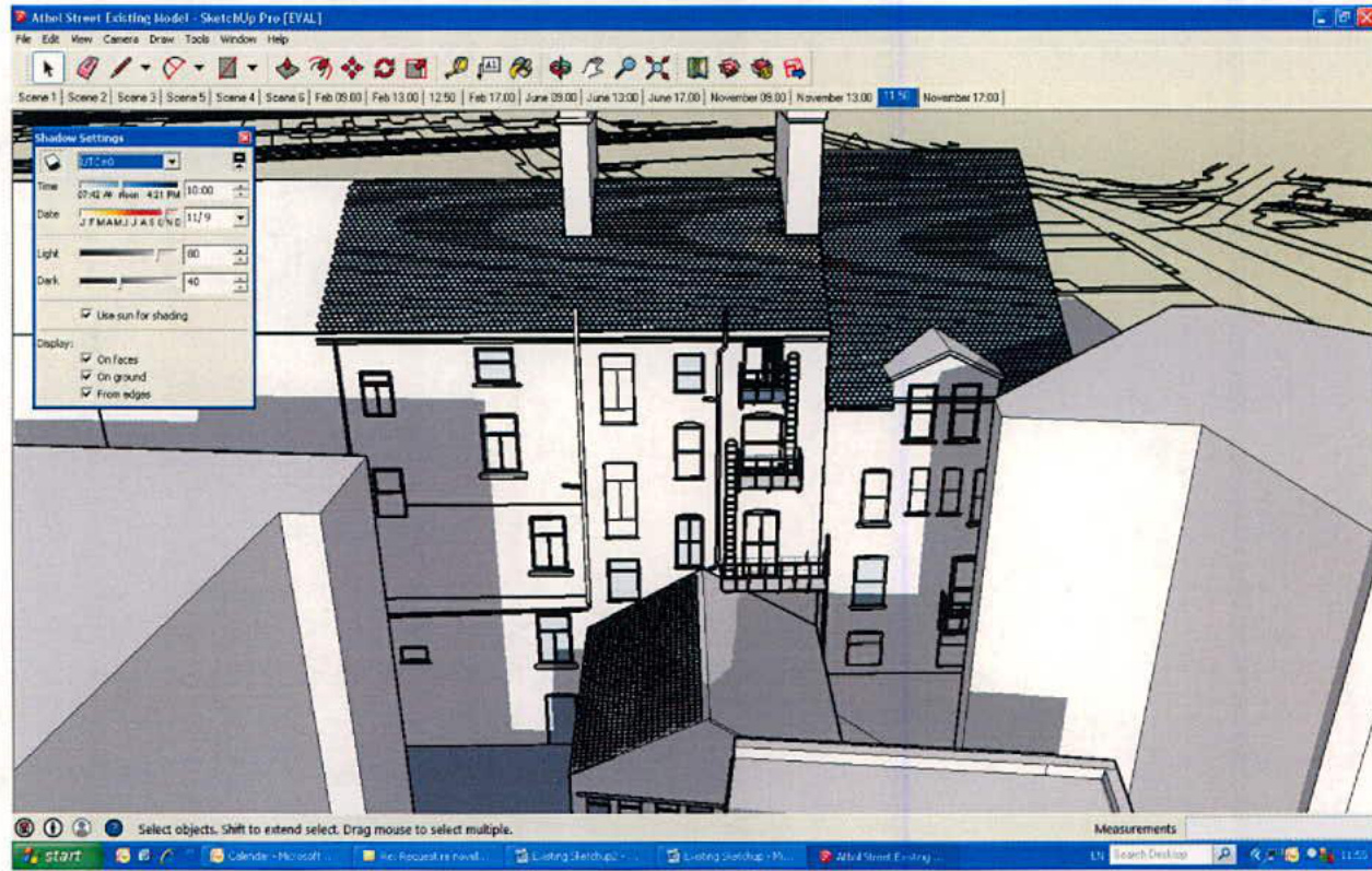 A screenshot of a SketchUp 3D modeling software interface displaying a digital model of a terraced building row with chimneys and windows.