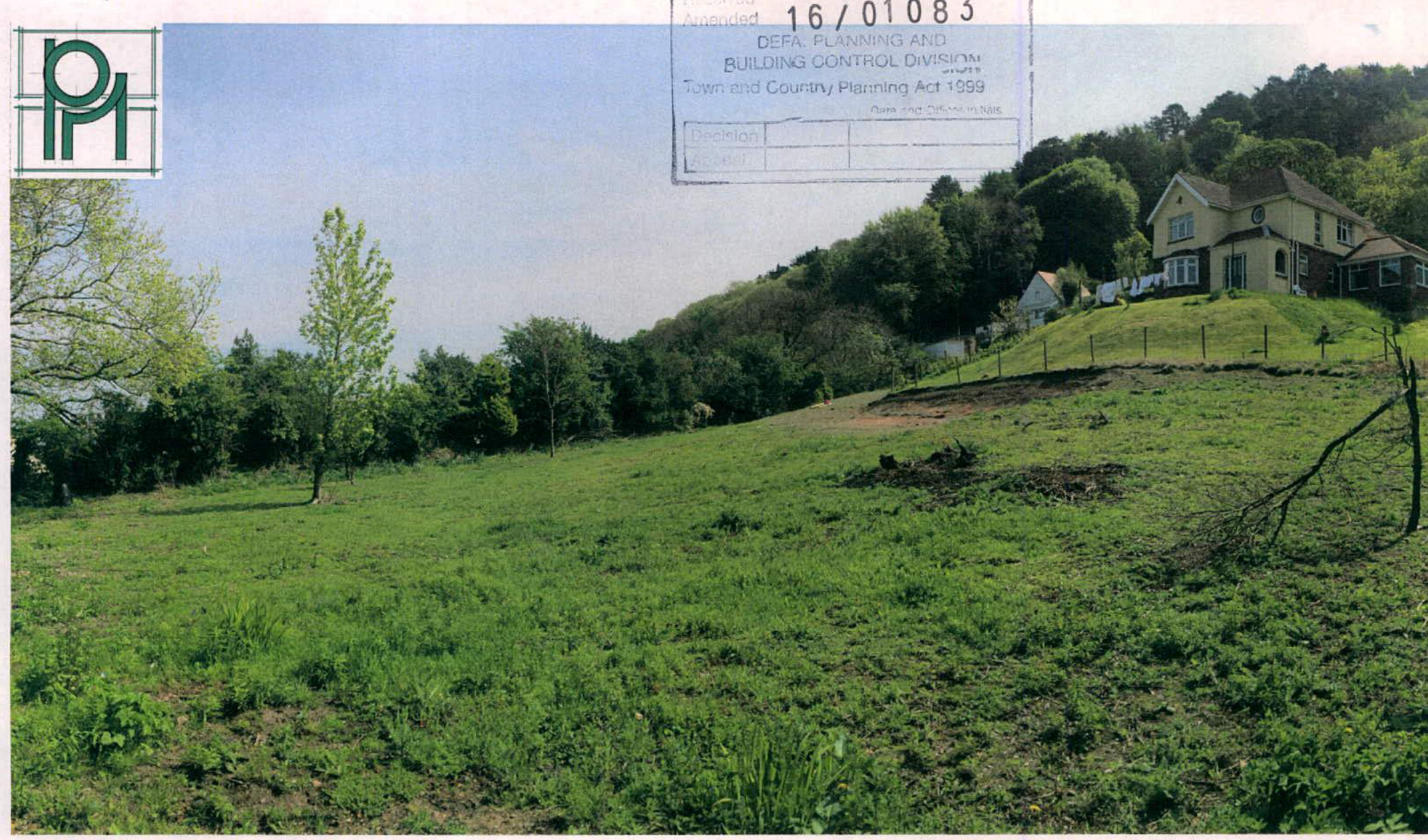 A photograph showing a grassy field and hillside with a large house in the background, stamped with planning application details.