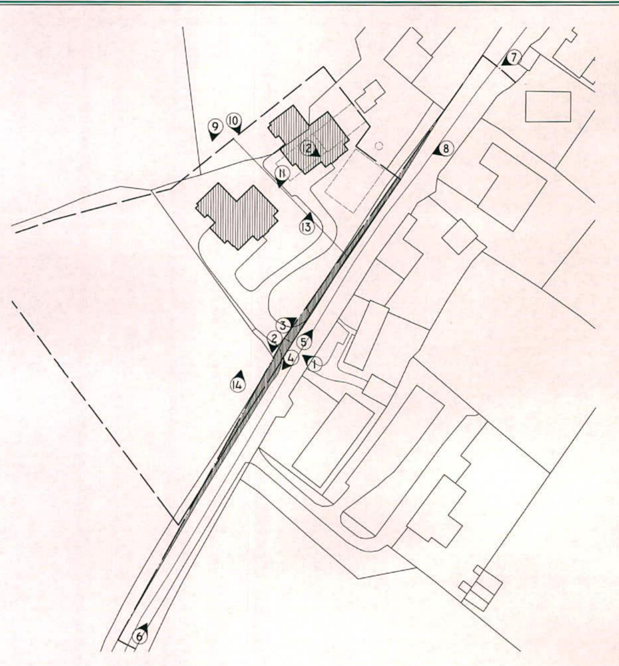 This image shows a site plan illustrating a road with surrounding properties and two hatched areas indicating proposed new detached dwellings.
