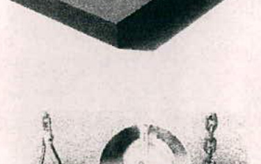 A grainy, low-resolution photograph showing a close-up of a dark structural beam overhead and hanging chains below, resembling a swing set.