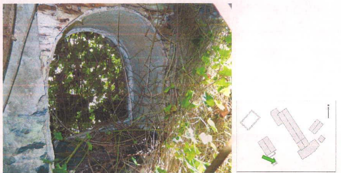 A composite document page featuring a close-up photograph of a dilapidated stone archway overgrown with vegetation on the left, and a small block plan showing building footprints on the right.