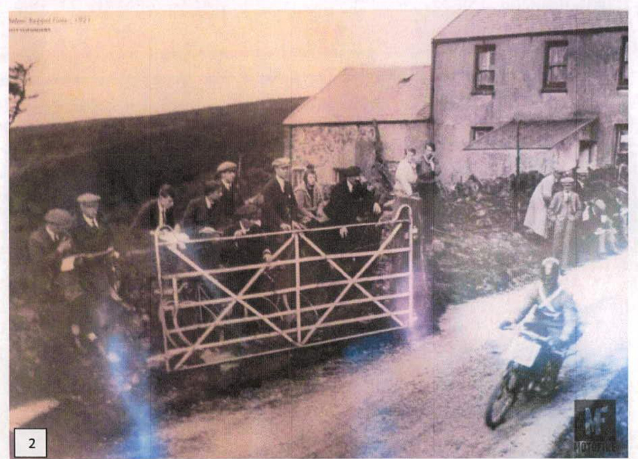 A historical sepia-toned photograph from 1927 showing a group of people behind a metal gate with a stone building in the background.