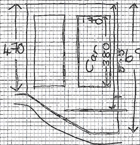 A hand-drawn sketch on graph paper showing site dimensions, layout outlines, and boundary lines.
