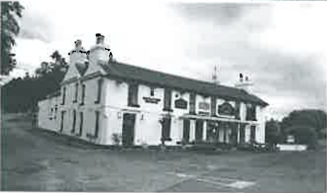 A black and white photograph showing the exterior elevation of a two-story building, identified as a public house.