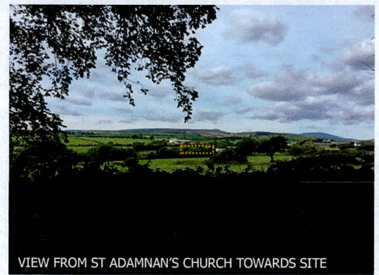 A landscape photograph showing a view from St Adamnan's Church towards the proposed development site, featuring green fields and distant hills.