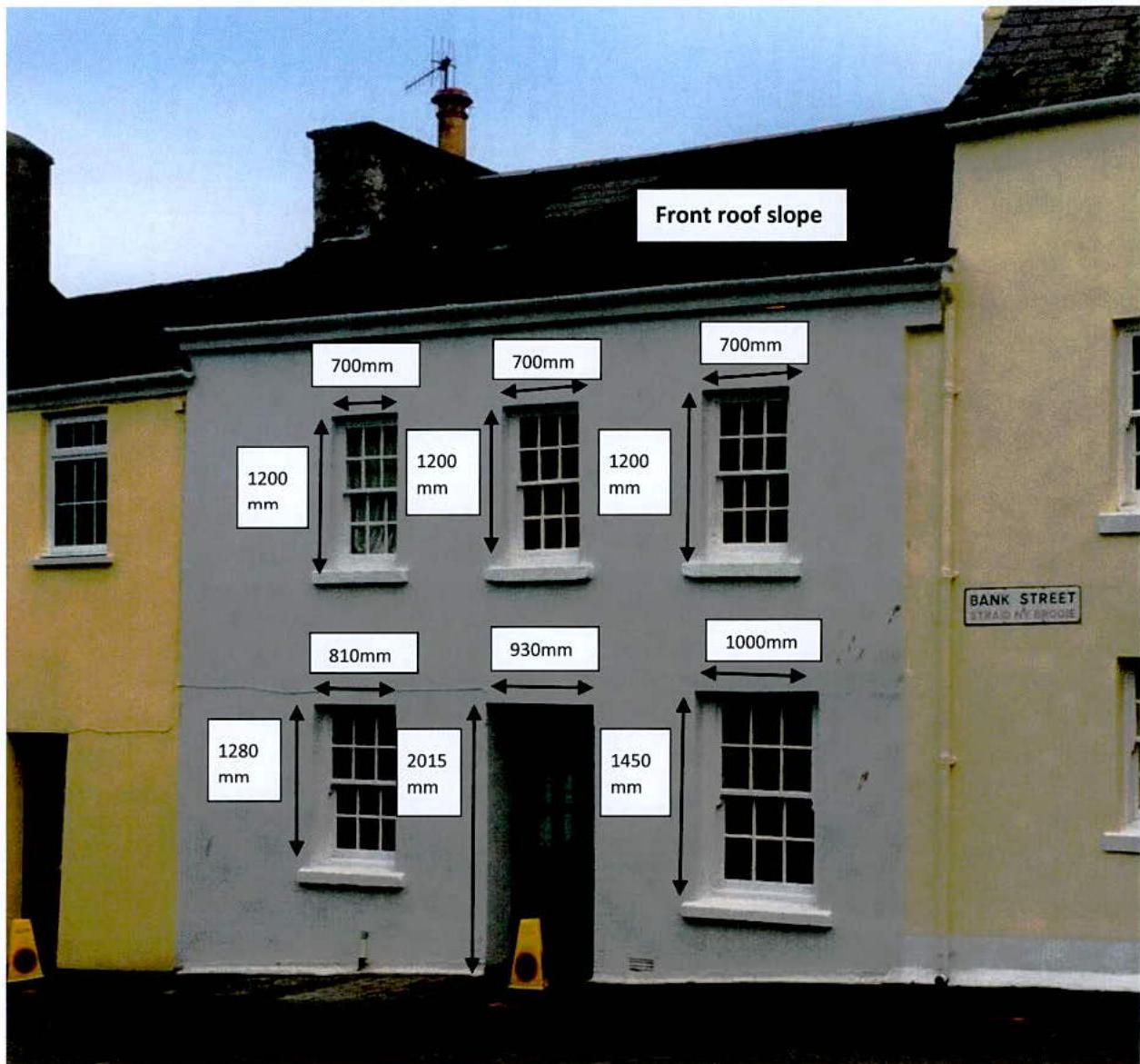An annotated photograph of a two-storey terraced building facade displaying digital measurement overlays for windows and doors.