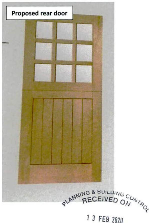 A scanned document page showing a detail of a proposed wooden rear door with a grid of windows and paneling, accompanied by a planning receipt stamp.
