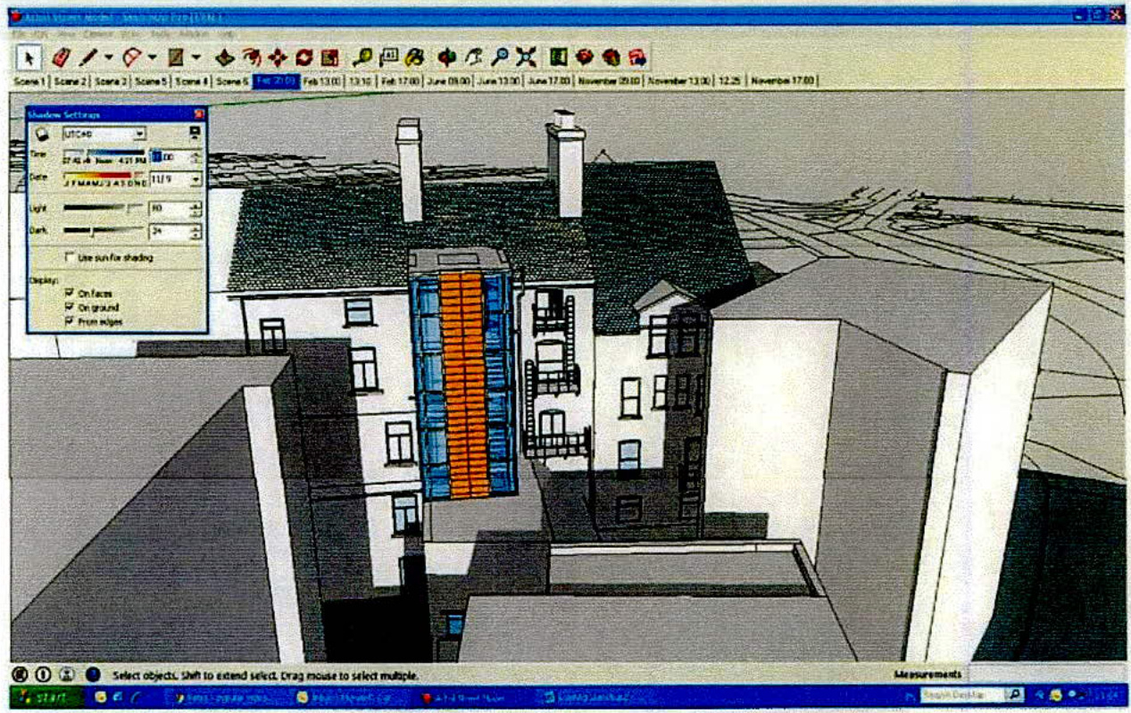 A screenshot of architectural software displaying a 3D model of a building with a proposed multi-story rear extension highlighted in blue and orange.