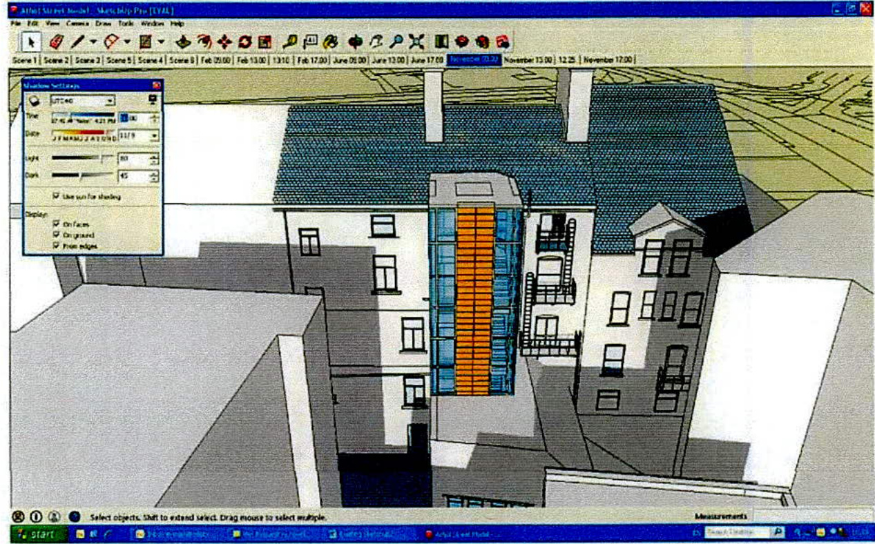 A screenshot of architectural software displaying a 3D model of a terraced building with a highlighted rear extension.