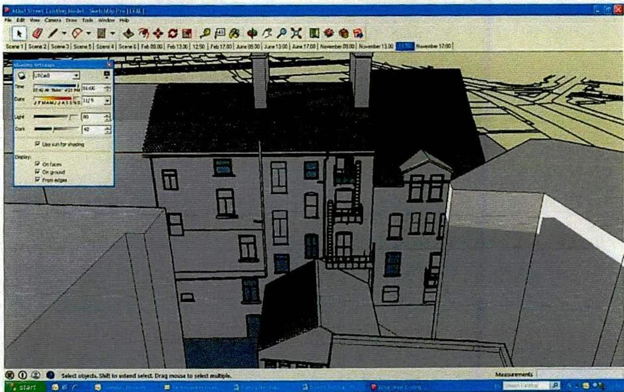 A screenshot of a 3D modeling software interface displaying a rendered model of a row of terraced buildings and adjacent structures.