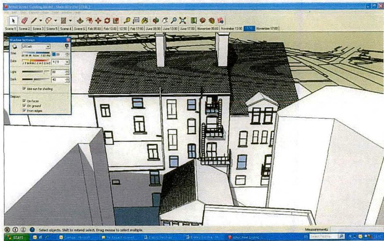 A screenshot of 3D architectural modeling software displaying a rendered view of a multi-story terraced building with chimneys and balconies.