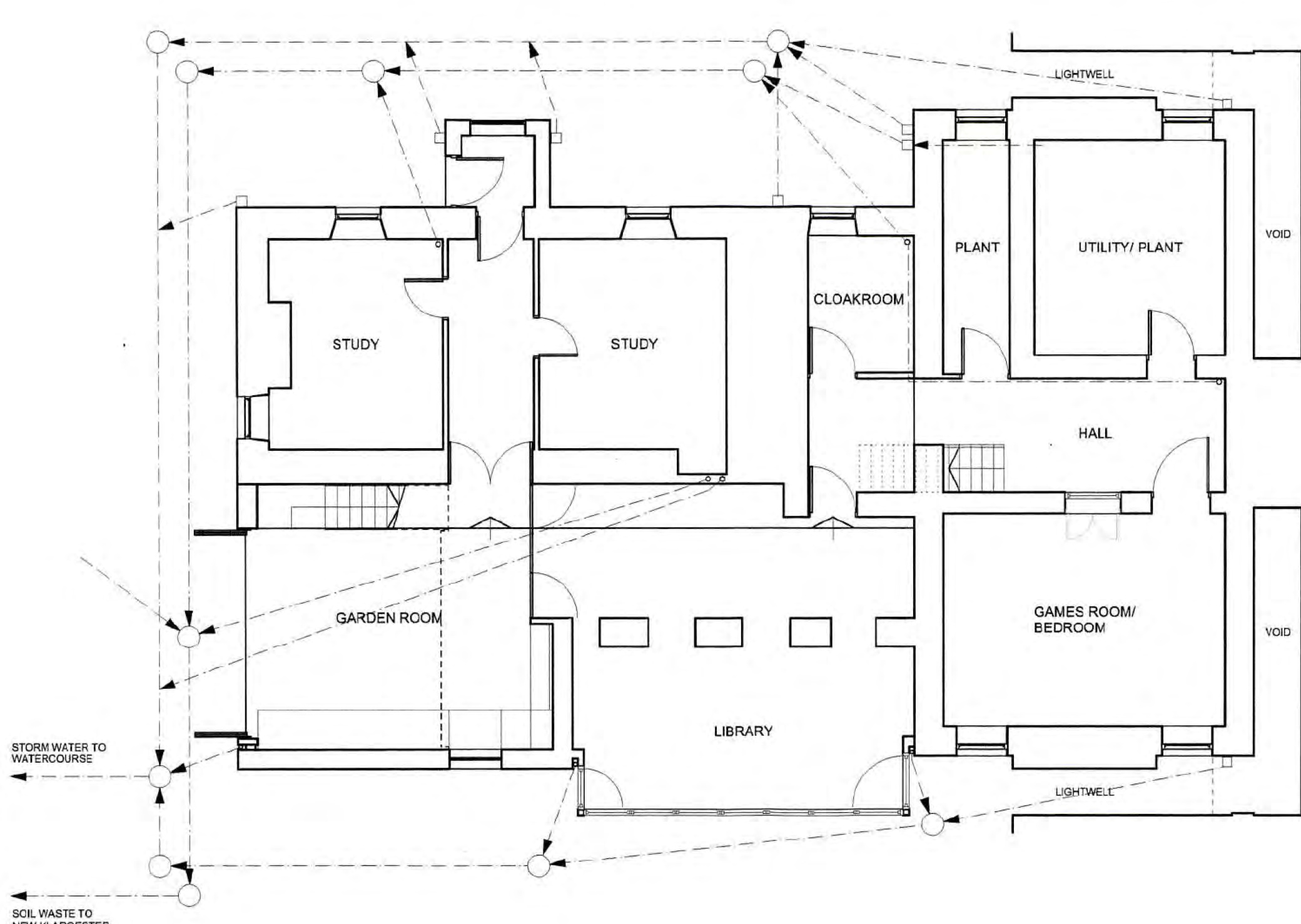 Architectural floor plan showing room layouts including studies, a library, and garden room with drainage annotations.