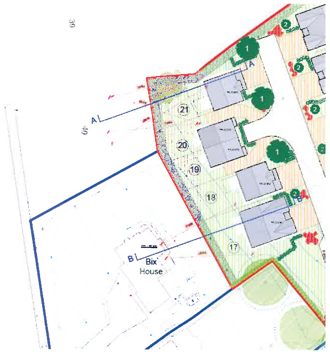 This image shows a site plan for a residential development, illustrating the layout of proposed houses, landscaping areas, and property boundaries.