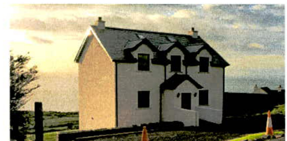 A grainy image depicting a white, two-story detached house with a pitched roof, situated in a rural setting with traffic cones visible in the foreground.