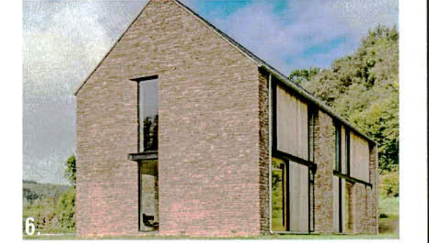 Architectural perspective rendering of a proposed modern two-storey brick dwelling with large windows set against a rural backdrop.