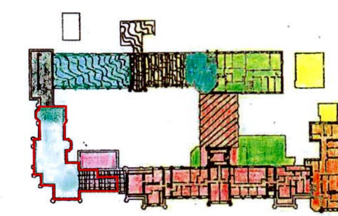 A colored architectural floor plan showing the internal layout of a building, with specific areas highlighted in red, blue, and green.