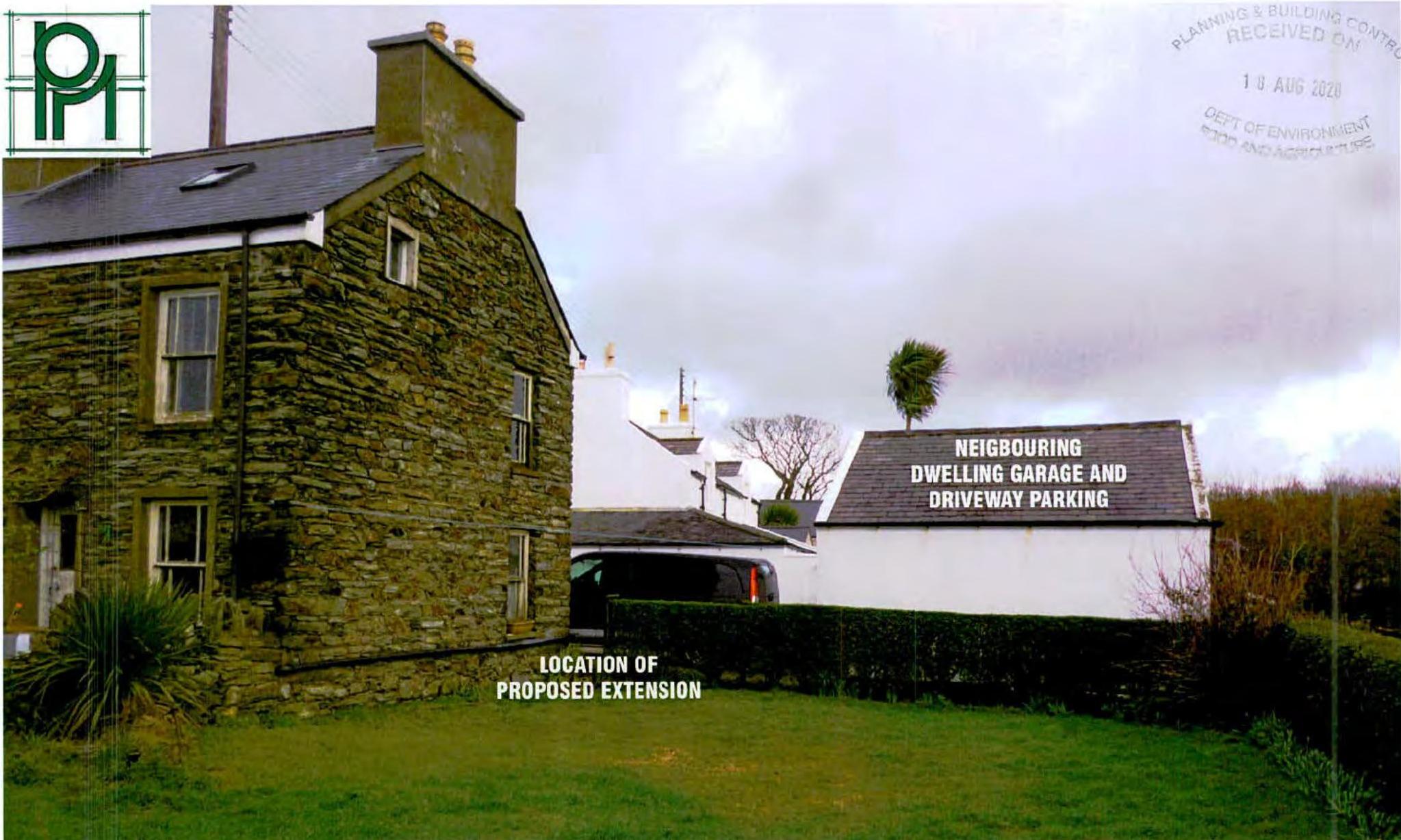 A photograph of a stone house and a white garage building, annotated with text indicating the location of a proposed extension and neighboring parking.